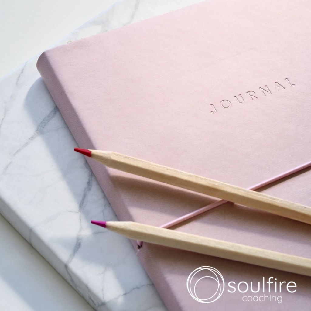 A journal and pencils: journalling a foundational habit